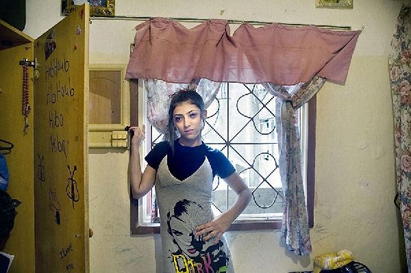 黎巴嫩女摄影师作品：走进各国女孩闺房 各具特色(高清组图)