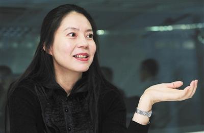 前女网队员胡娜回国解说中网 30年前"叛逃"美国(组图)