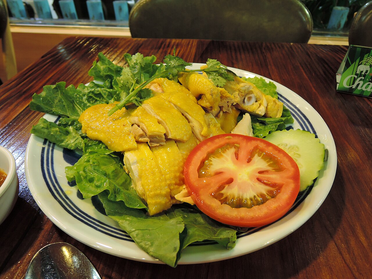 Thai and hoi nan chicken in half.jpg